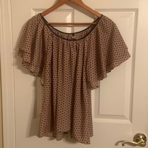 Vintage, retro, flowy blouse with swoop neck and roomy sleeves.